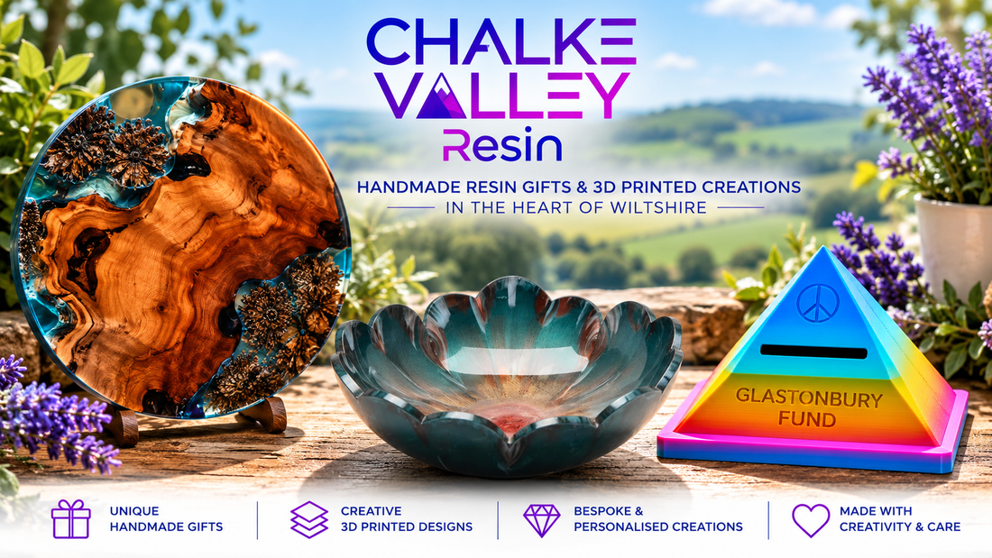Chalke Valley Resin handmade resin art and 3D printed gifts in Wiltshire, featuring a decorative wooden resin tabletop, flower-shaped resin bowl and colourful Glastonbury Fund pyramid money box.