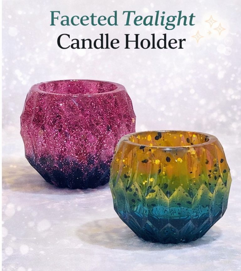 Two faceted tealight candle holders, one pink and one multicolored, on a white background.