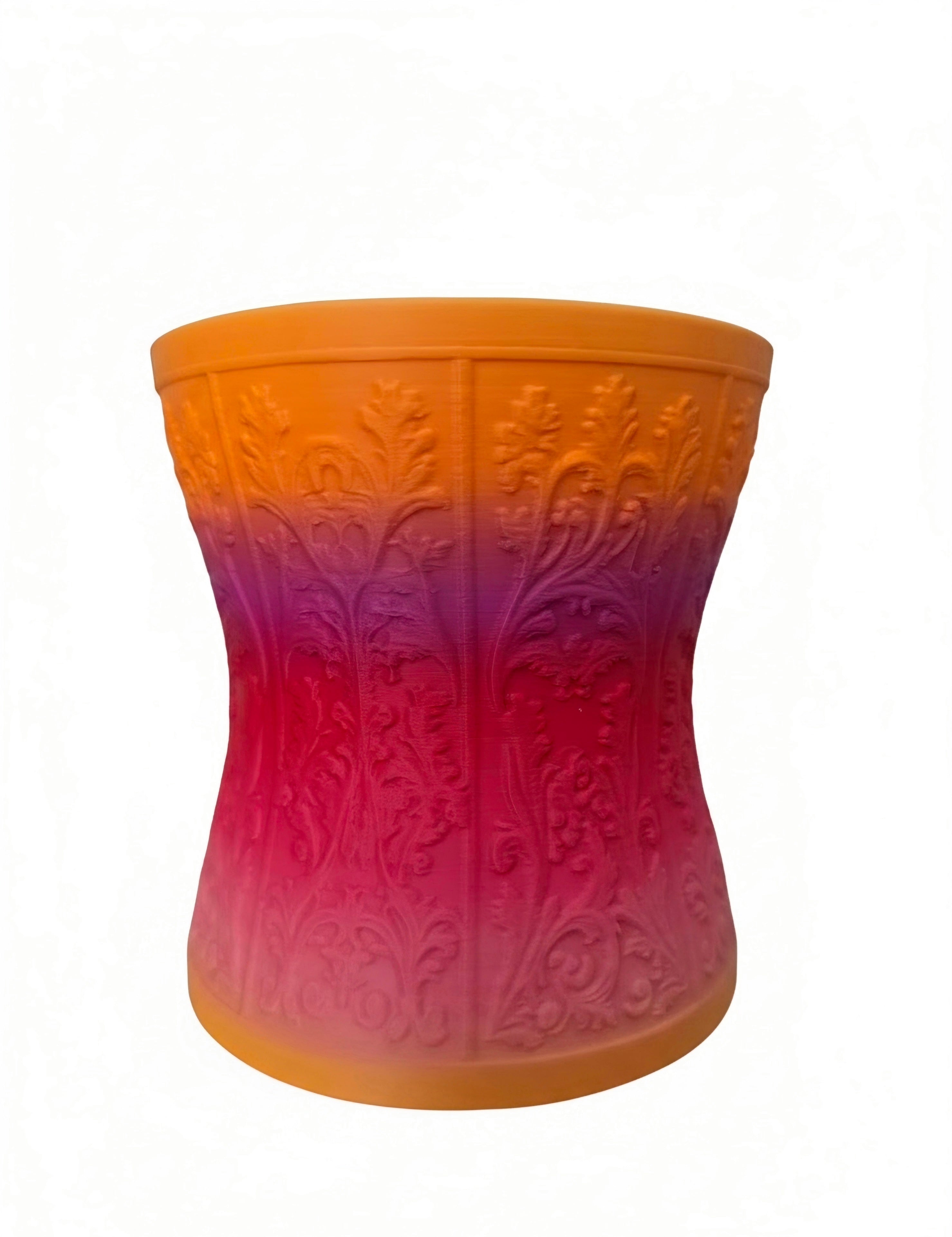 A makeup brush holder using rainbow  PLA.  A lace-up corset design.  Set against a plain white background.