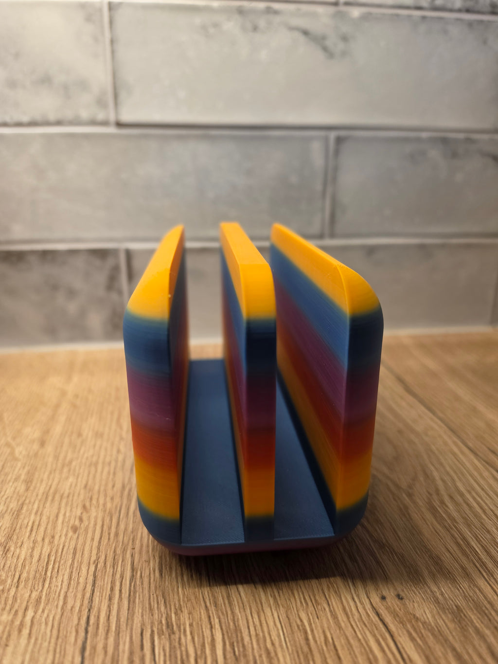 Colourful letter rack with 'POST' branding on the surface.