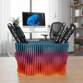 Rainbow pen holder on a desk in an office setting